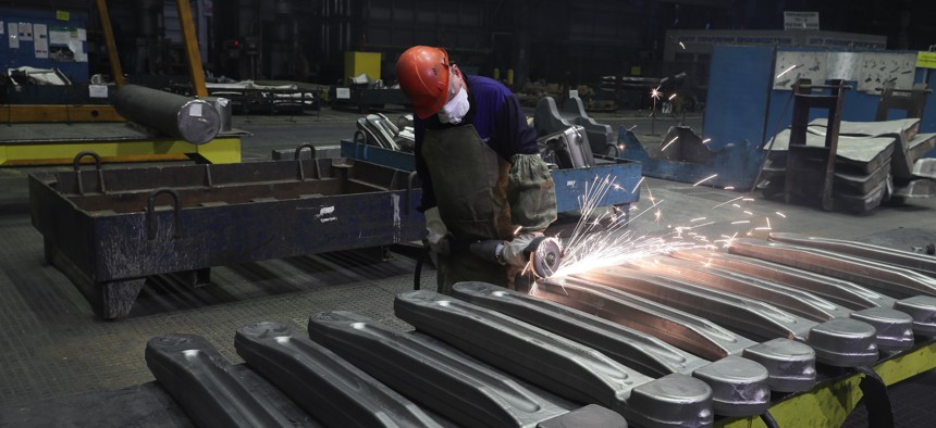 A worker deburrs titanium parts at VSMPO-AVISMA Corporation, the Russian firm that is the world's largest titanium producer. 