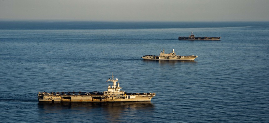 France's Charles de Gaulle, left, Italy's Cavour, USS Harry S. Truman, and their associated carrier strike groups exercised together in the Mediterranean Sea on Feb. 7.