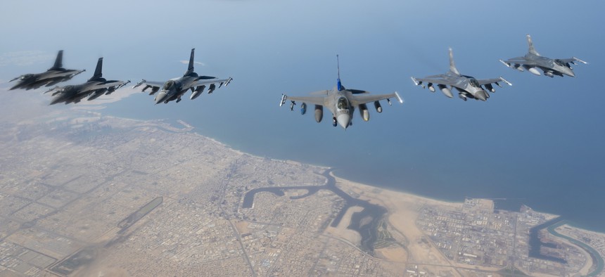 U.S. Air Force F-16 Fighting Falcons assigned to the 332d Air Expeditionary Wing fly in formation above the Arabian Gulf en route to an exercise with a partner nation, Feb. 26, 2022. 