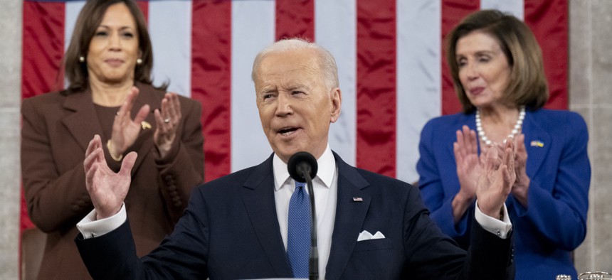 President Joe Biden delivers the State of the Union address as U.S. Vice President Kamala Harris (L) and House Speaker Nancy Pelosi (D-Calif.) look on during a joint session of Congress, March 1, 2022 in Washington, DC.