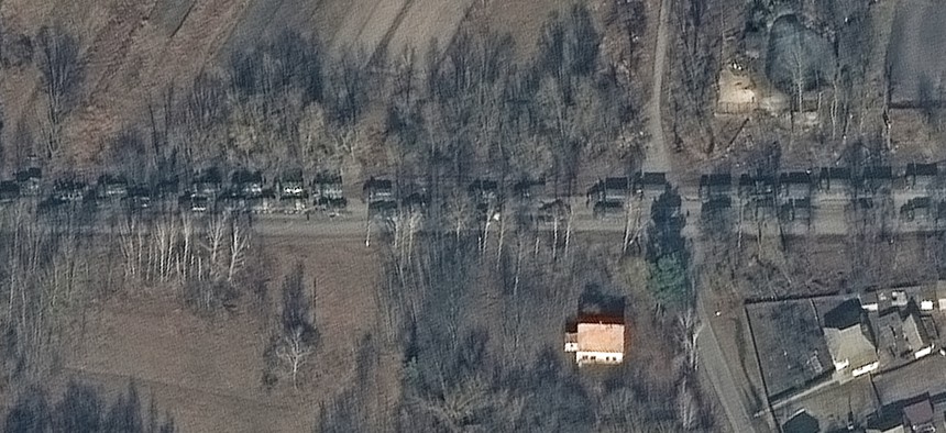 A large deployment of Russian ground forces, containing hundreds of military vehicles, are seen in convoy northeast of Ivankiv, Ukraine on February 27, 2022.