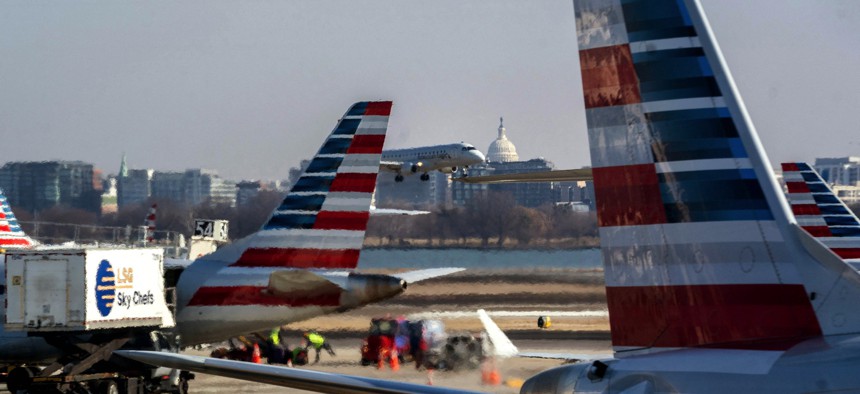 Aircraft land and taxi at Ronald Reagan National Airport outside Washington, D.C., on Feb. 16, 2022.