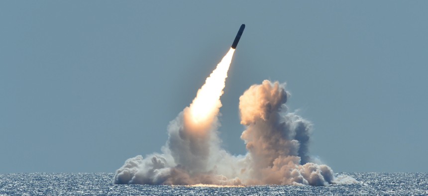 An unarmed Trident II D5 missile launches from the Ohio-class ballistic missile submarine USS Nebraska (SSBN 739) off the coast of California in 2008.