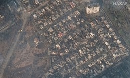 Maxar satellite imagery of destroyed homes and buildings on March 9, 2022.