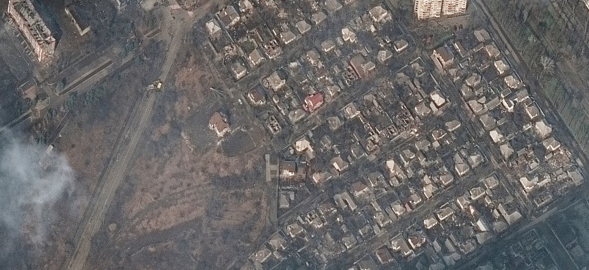 Maxar satellite imagery of destroyed homes and buildings on March 9, 2022.