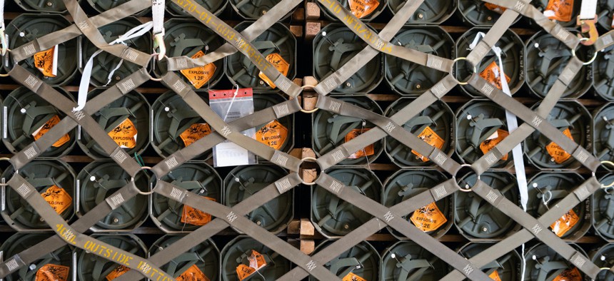 Pallets of ammunition, weapons and other equipment bound for Ukraine are processed through the 436th Aerial Port Squadron during a foreign military sales mission at Dover Air Force Base, Delaware, Jan. 21, 2022. 