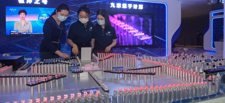 Participants view a quantum computing prototype model during the 2021 Quantum Industry Conference in Hefei, China, Sept. 18, 2021. 