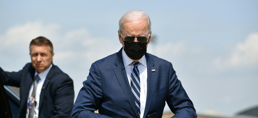 President Joe Biden makes his way to board Air Force One before departing from Andrews Air Force Base in Maryland on April 14, 2022. 