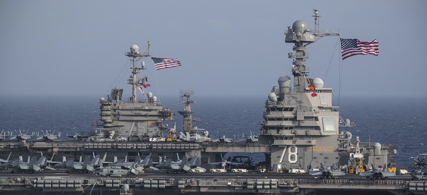 The Ford-class aircraft carrier USS Gerald R. Ford (CVN 78) and the Nimitz-class aircraft carrier USS Harry S. Truman (CVN 75) transit the Atlantic Ocean June 4, 2020, the first time a Ford-class and a Nimitz-class aircraft carrier operated together underway. 