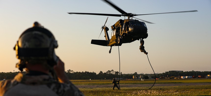 U.S. special operations service members participate in Fast Rope Insertion and Extraction System (FRIES) training at Gulfport Combat Readiness Training Center, Gulfport, Mississippi, April 22, 2022.