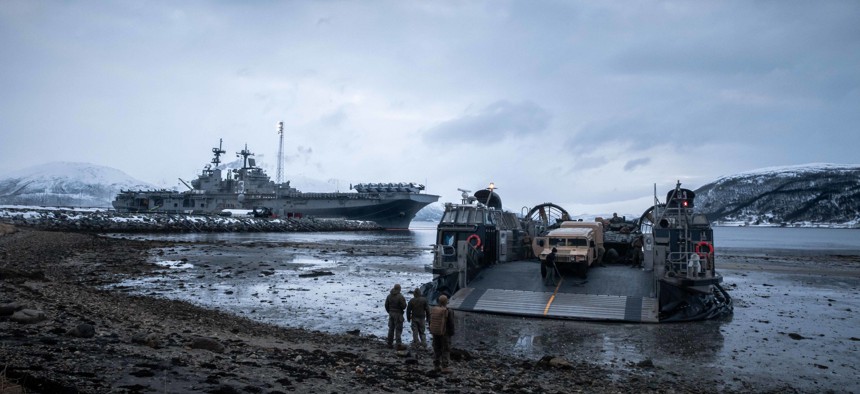 An LCAC hovercraft disembarks the Wasp-class amphibious assault ship USS Kearsarge (LHD 3) during a Marine Expeditionary Unit bilateral training event in Tromsø, Norway, April 12, 2022.