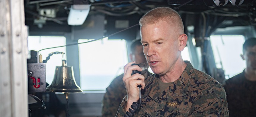 Maj. Gen. Paul J. Rock Jr., then-deputy commander of the 3rd Marine Expeditionary Force, speaks over the 1MC aboard the amphibious assault ship USS Boxer in 2019.