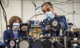 Naval Postgraduate School physics professor Frank Narducci shows a Dual Atom Interferometer Accelerometer to Deputy Defense Undersecretary for Research & Engineering Barbara McQuiston on Dec. 14, 2021.