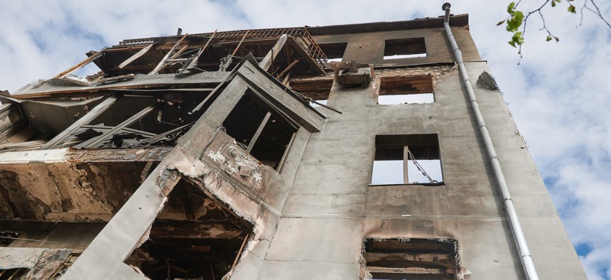 The facade of a building damaged in the Russian military offensive on April 29, 2022, in Kharkiv, Ukraine. 