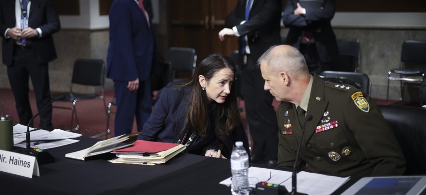 Avril Haines (L), Director of National Intelligence, and Lt. Gen. Scott Berrier (R), Director of the Defense Intelligence Agency, confer prior to testifying before the Senate Armed Services Committee on May 10, 2022 in Washington, DC.