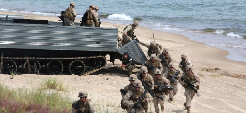 An international Corps of Marines from Sweden, Finland, and the U.K. conduct amphibious assaults on a beachhead in Ravlunda, Sweden, during NATO's BALTOPS exercise in 2015.