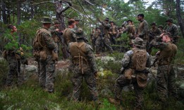 A U.S. Marine platoon (reinforced) from 1st Battalion, 6th Marine Regiment, 2d Marine Division, conducts an after action debrief during Exercise Archipelago Endeavor, on Berga Naval Base, Sweden, Sept. 11, 2021. 
