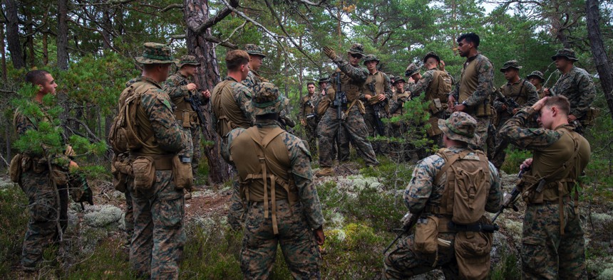 A U.S. Marine platoon (reinforced) from 1st Battalion, 6th Marine Regiment, 2d Marine Division, conducts an after action debrief during Exercise Archipelago Endeavor, on Berga Naval Base, Sweden, Sept. 11, 2021. 