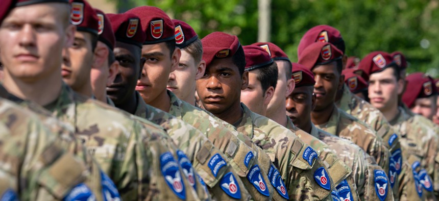 U.S. Army soldiers assigned to the 2nd Brigade Combat Team (Airborne), 11th Airborne Division, stand at Pershing Parade Field during the reflagging ceremony of the 11th Airborne Division, June 6, 2022, Joint Base Elmendorf-Richardson, Alaska.