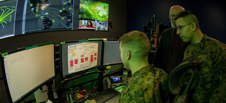 Marines with Marine Corps Forces Cyberspace Command in the cyber operations center at Lasswell Hall aboard Fort Meade, Maryland, Feb. 5, 2020.