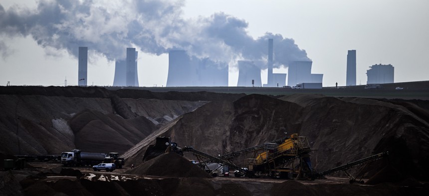 Coal is mined and burned in northwestern Germany's Garzweiler open-pit mine and Neurath power plant in April 2022.