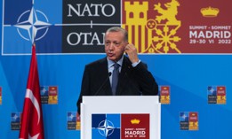 Turkish President Recep Tayyip Erdogan addresses the second and final day of the NATO 2022 Summit on, June 30, 2022, in Madrid, Spain. 