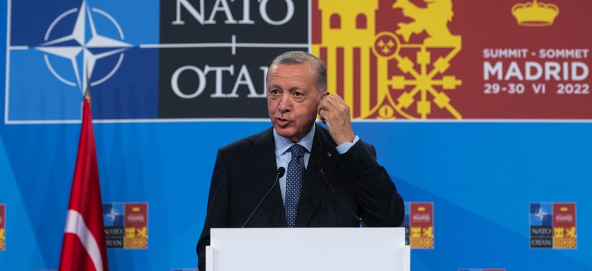 Turkish President Recep Tayyip Erdogan addresses the second and final day of the NATO 2022 Summit on, June 30, 2022, in Madrid, Spain. 