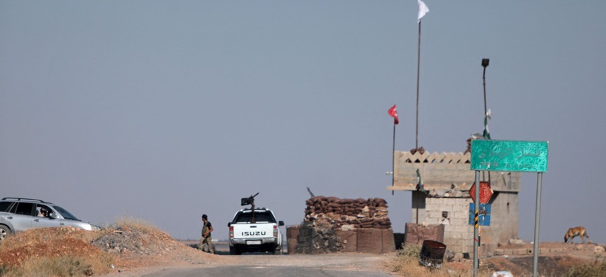 Security forces block an entrance to the village of Humayra on June 16, 2022.