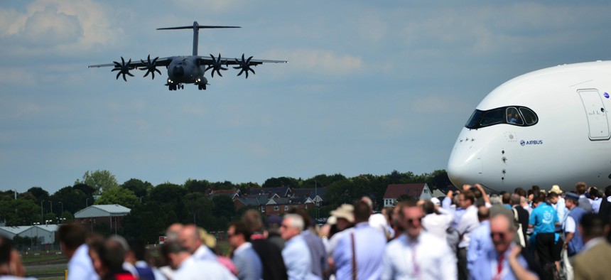  An Airbus A400M military transport plane comes in to land during an air display on the second day of the Farnborough International Air show in Hampshire, England, on July 15, 2014. 