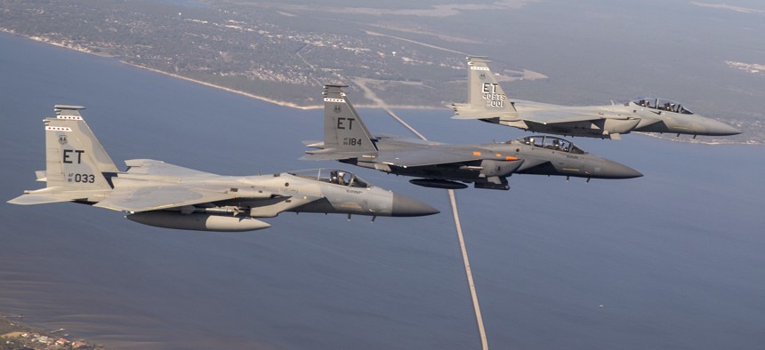 An F-15C, F-15E, and F-15EX fly together over Florida in March 2021.