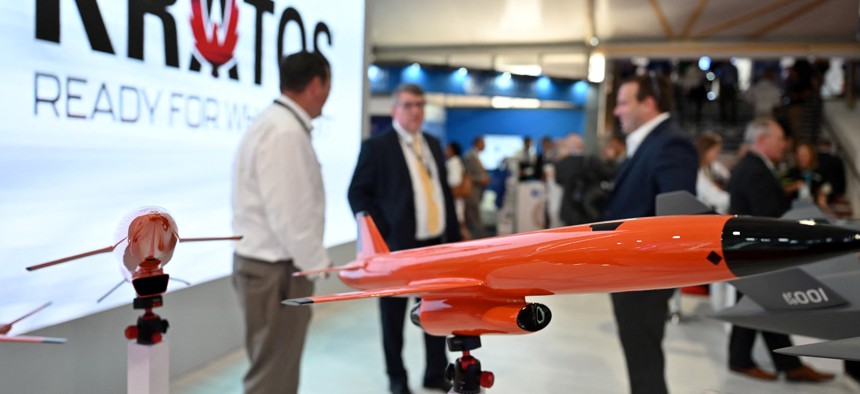 Models of UAVs are displayed at the Kratos Defense & Security Solutions stand at the Farnborough Airshow, in Farnborough, on July 19, 2022.