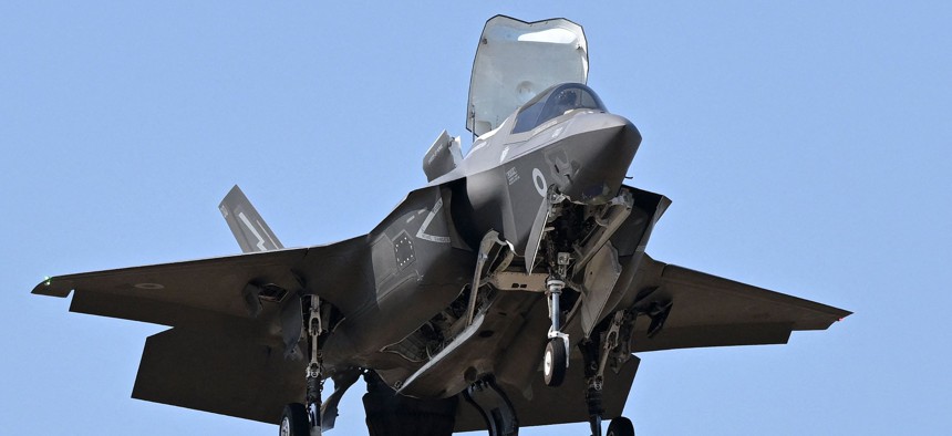 A Lockheed Martin F-35 fighting jet takes part in a flying display at the Farnborough Airshow, in Farnborough, on July 19, 2022.