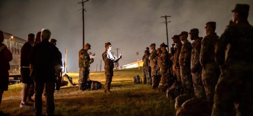Soldiers stand in formation for accountability during an exercise on Fort Sam Houston, Texas, May 11, 2022.