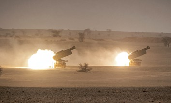 U.S. M142 High Mobility Artillery Rocket System (HIMARS) launchers fire salvoes during the "African Lion" military exercise in southeastern Morocco on June 9, 2021.