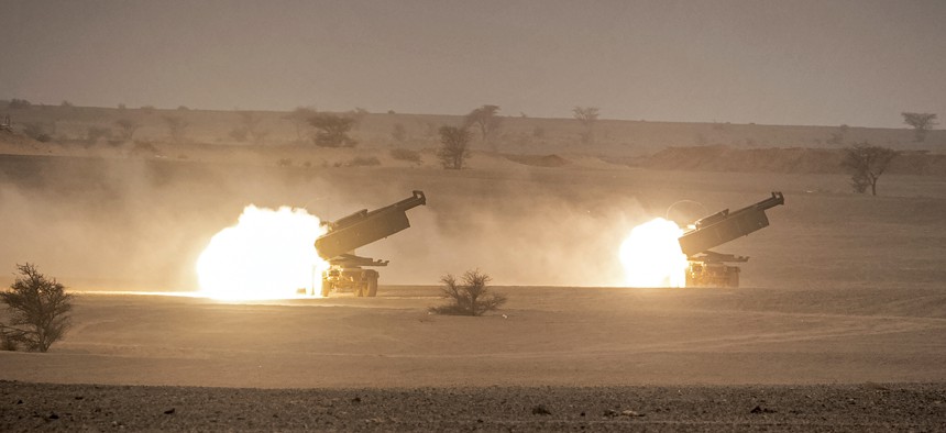 U.S. M142 High Mobility Artillery Rocket System (HIMARS) launchers fire salvoes during the "African Lion" military exercise in southeastern Morocco on June 9, 2021.
