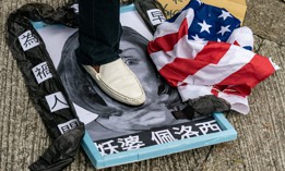  A pro-China supporter steps on a defaced photo of U.S. House of Representatives Speaker Nancy Pelosi during a protest against her visit to Taiwan outside the Consulate General of the United States on August 03, 2022 in Hong Kong, China