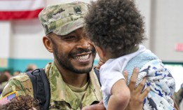 Army Staff Sgt. Denard Williams reunites with his family at Fort Stewart, Ga., July 2, 2021, following a nine-month deployment to South Korea.