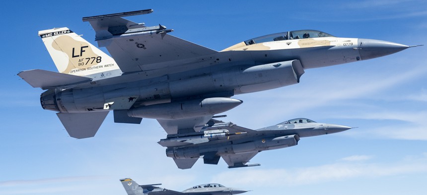 U.S. Air Force F-16 Fighting Falcons with Luke Air Force base prepare to be refueled by a KC-135 Stratotanker from the 161st Air Refueling Wing during a local sortie on Aug. 6, 2022.