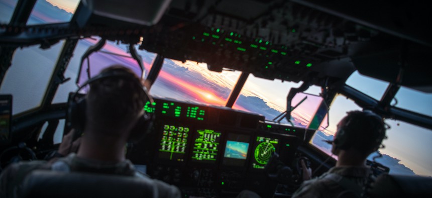 U.S. Air Force pilots assigned to the 352d Special Operations Wing fly an MC-130J Commando II during pilot proficiency training, U.K., Aug. 3, 2022. 