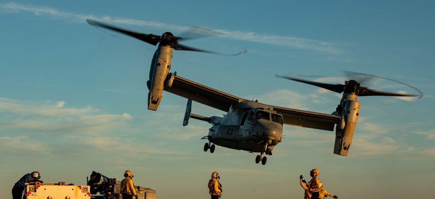U.S. Marines assigned to the Aviation Combat Element, 22nd Marine Expeditionary Unit (MEU), and Sailors assigned to the Wasp-class amphibious assault ship USS Kearsarge (LHD 3) conduct MV-22 Osprey flight operations in the Atlantic Ocean, July 11, 2022.