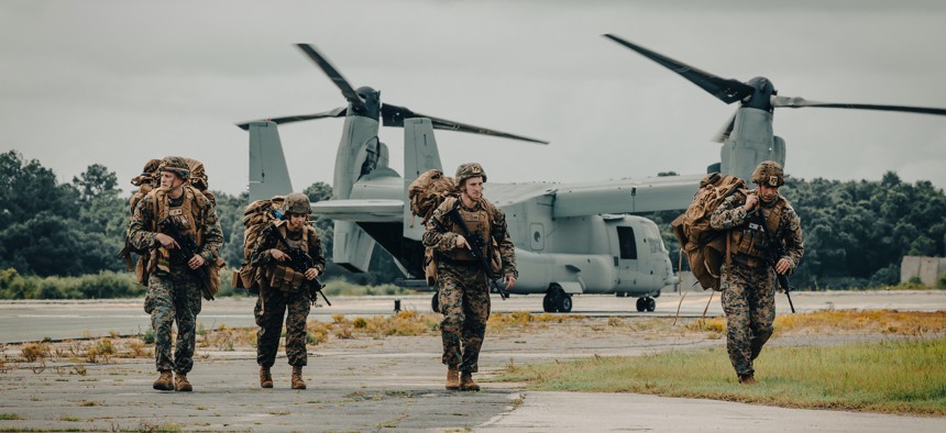 Leaders with the 26th Marine Expeditionary Unit Forward Command Element arrive on Marine Corps Auxiliary Landing Field Bogue, North Carolina, Aug. 23, 2022. 
