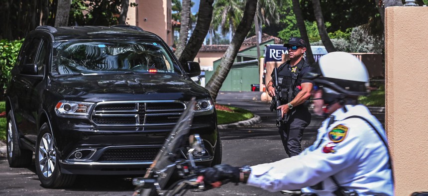 Secret Service and local law enforcement officers are seen in front of the home of former President Donald Trump at Mar-A-Lago in Palm Beach, Florida on August 9, 2022.