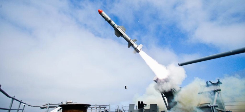 In this file photo, a Harpoon anti-ship missile launches from a U.S. Navy cruiser.