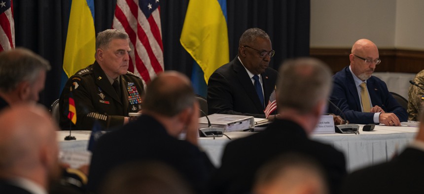 Chairman of the Joint Chiefs of Staff Gen. Mark A. Milley and Defense Secretary Lloyd J. Austin III give opening remarks at the fifth Ukrainian Defense Contact Group meeting at Ramstein Air Base, Germany, Sept. 8, 2022. 