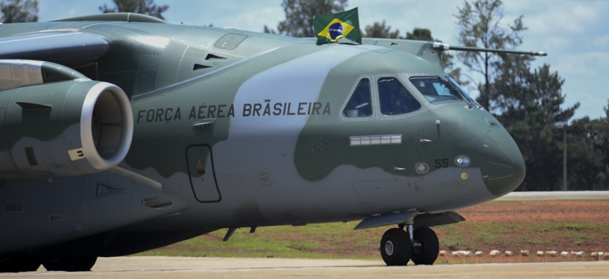 A Brazilian Air Force KC-390 plane arrives with people who resided in Ukraine that were rescued in Operation Repatriation.