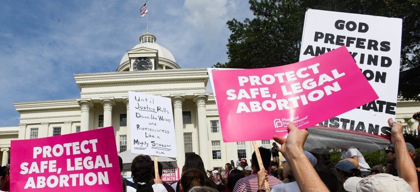 MONTGOMERY, AL - MAY 19: Protestors participate in a rally against one of the nation's most restrictive bans on abortions on May 19, 2019 in Montgomery, Alabama. Demonstrators gathered to protest HB 314, a bill passed by the Alabama Legislature last week making almost all abortion procedures illegal.