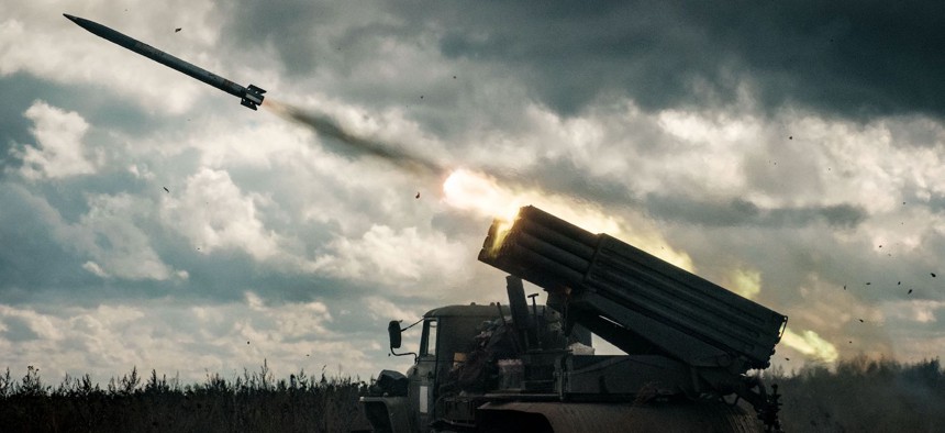 A rocket is launched from a truck-mounted multiple rocket launcher towards Russian positions in Kharkiv region on October 4, 2022.
