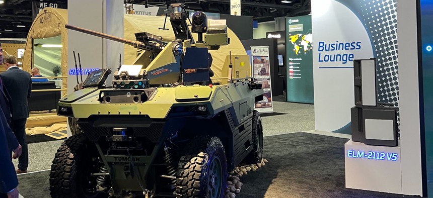 An armed ground robot on the floor of the AUSA conference in Washington, D.C. on October 12, 2022.