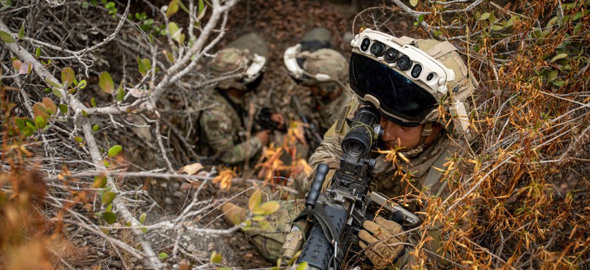 U.S. Army Soldiers assigned to 5th Squadron, 73rd Cavalry Regiment, 3rd Brigade Combat Team, 82nd Airborne Division, experiment with the Integrated Visual Augmentation System (IVAS) during Project Convergence 2022 at Camp Talega, Calif., Oct. 14, 2022. 
