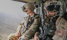 U.S. Army Sgt. Jared Row and Spc. Jordan Deblasi, assigned to 82nd Airborne 3rd Brigade Combat Team, observe area of operations during Project Convergence (PC22) at Camp Talega on Camp Pendleton, California on Oct. 12, 2022.